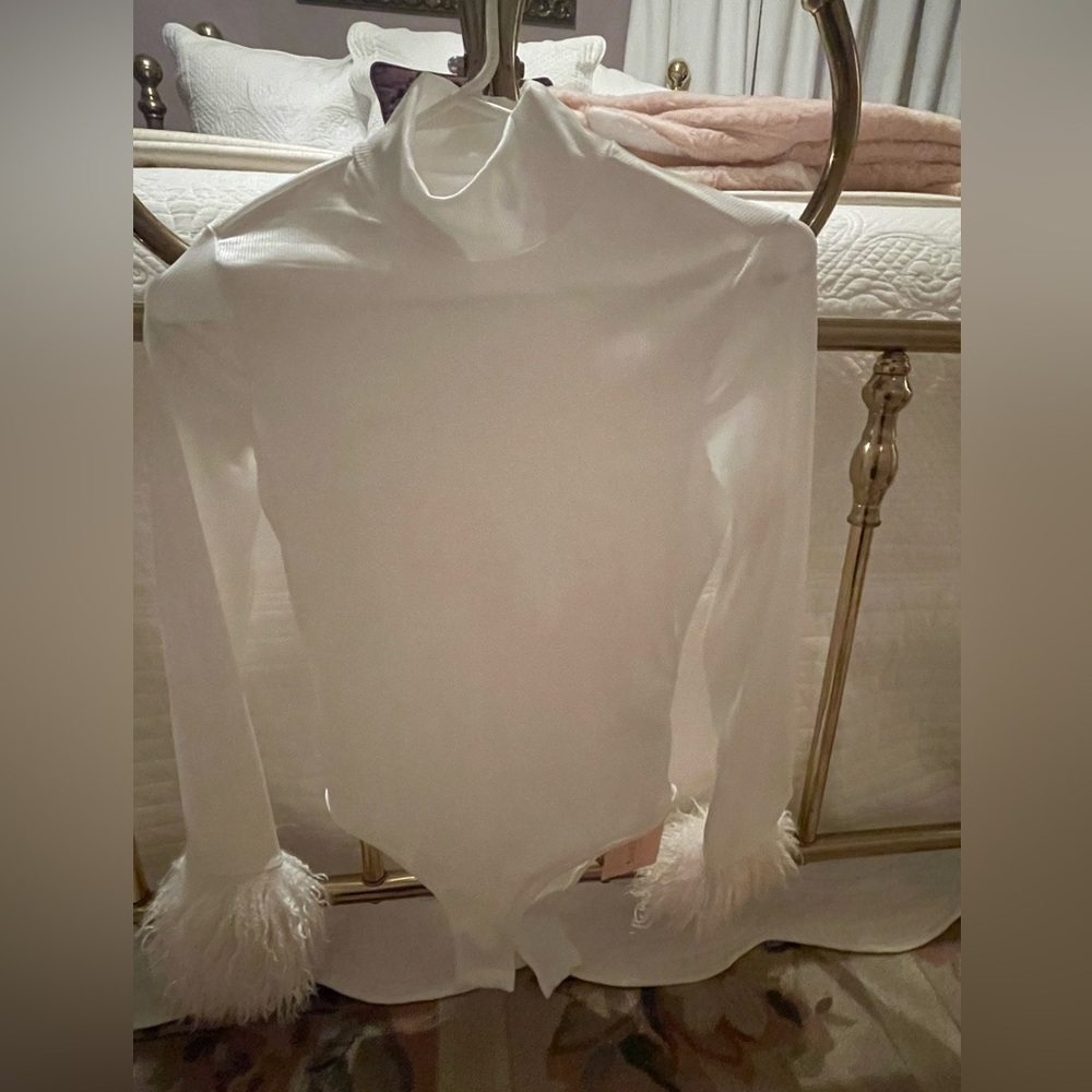 Brand New w tags White Ribbed Knit Feather Cuff  Body Suit. Size Small.